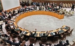 FILE - Security Council members vote for new sanctions against North Korea after its most recent nuclear test, at U.N. headquarters, New York, March 7, 2013.