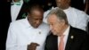 Guinea's President and AU President Alpha Conde talks to UN Secretary-General Antonio Guterres at the 30th Ordinary Session of the Assembly of the Heads of State and the Government of the AU in Addis Ababa, Jan. 28, 2018.