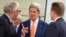 U.S. Secretary of State John Kerry, center, speaks with Dutch Foreign Minister Frans Timmermans, left, and Norwegian Foreign Minister Borge Brende, during a meeting of the North Atlantic Council in Foreign Ministers Session at NATO headquarters in Brussel, Belgium, June 25, 2014.