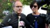 Parents of the late American Shane Todd, Mary, right, and Rick Todd, left, arrive to waiting press at the Subordinate Courts, May 13, 2013, in Singapore.