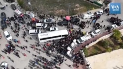 ফিলিস্তিনি বন্দিদের নিয়ে রেড ক্রসের বাস পৌঁছেছে রামাল্লায়