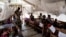 FILE - Mothers sit with their severely malnourished children inside a feeding and rehabilitation centre on October 23, 2017 in Tshikapa. 
