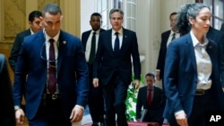 FILE—U.S. Secretary of State Antony Blinken, center, walks to meet with Egyptian Foreign Minister Sameh Shoukry, in Cairo, Egypt, March 21, 2024. 