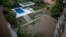 Grass sits dry due to the lack of water, at a wealthy apartment complex in Caracas, Venezuela, June 11, 2018.