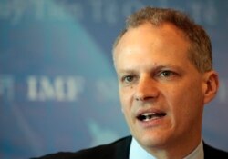 FILE - Alejandro Werner, Director of the Western Hemisphere Department of the International Monetary Fund, speaks during an IMF news conference in Montevideo, Uruguay, May 6, 2013.