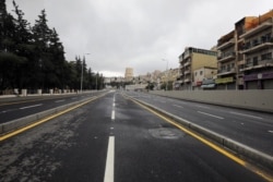 The streets of the Jordanian capital are seen empty after the start of a nationwide curfew, amid concerns over the coronavirus spread, in Amman, Jordan March 21, 2020.