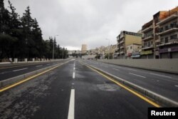 The streets of the Jordanian capital are seen empty after the start of a nationwide curfew, amid concerns over the coronavirus spread, in Amman, Jordan March 21, 2020.