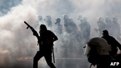Turkish police clash with protestors at a May Day demonstration in Istanbul, May 1, 2013.