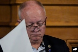 Georgia State Election Board member Rick Jeffares listens to debate during a meeting at the state Capitol, Sept. 20, 2024, in Atlanta.