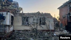 A view shows a damaged house following what local authorities called a Ukrainian military strike, in the town of Sudzha in the Kursk region, Russia, in this handout image released Aug. 6, 2024. (Acting Governor of Russia's Kursk region Alexei Smirnov Telegram/Handout via Reuters)