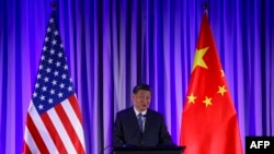 FILE —China's President Xi Jinping speaks at the "Senior Chinese Leader Event" held by the National Committee on US-China Relations and the US-China Business Council on the sidelines of the Asia-Pacific Economic Cooperation (APEC) Leaders' Week in San Francisco.