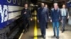 U.S. Secretary of State Antony Blinken, right and British Foreign Secretary David Lammy, walk along a platform to board a train at Przemysl railway station, in Poland, Sept. 11, 2024. 