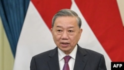 FILE - Vietnam's Communist Party General Secretary To Lam delivers his statement during a joint press conference with Indonesia's President Prabowo Subianto at the Presidential Palace in Jakarta on March 10, 2025.