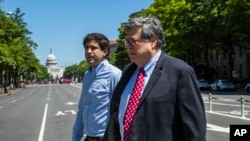 Attorney General William Barr crosses Pennsylvania Avenue NW from the Department of Justice building, May 30, 2020, in Washington. 