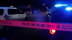 Chicago police crime scene tape marks the crime scene of a shooting of two men at the South Side of Chicago, Illinois, July 25, 2020.