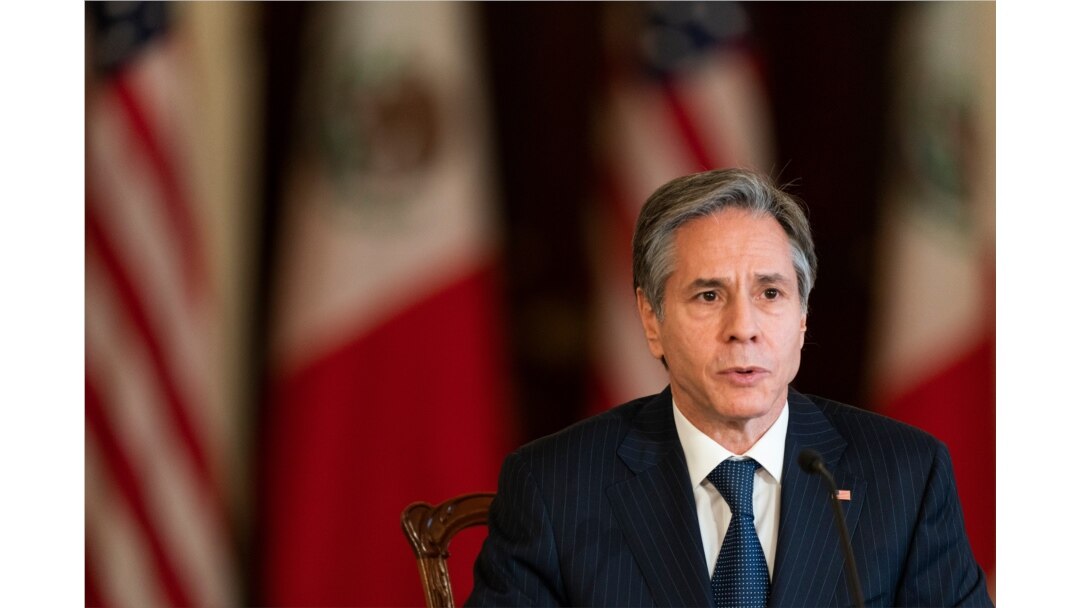 FILE - Secretary of State Antony Blinken speaks during a virtual meeting with Mexican Secretary of Economy Tatiana Clouthier, who is in Mexico City, Feb. 26, 2021, in the Benjamin Franklin room at the State Department in Washington.