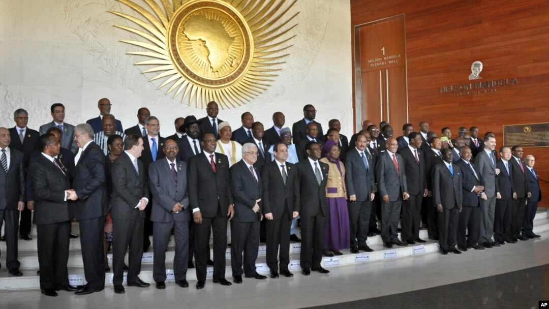 African heads of state, joined by Palestinian President Mahmoud Abbas, sixth from left in front row, and United Nations Secretary-General Ban ki-Moon, third from right in front row, pose for a group photograph at the annual African Union (AU) summit held at the AU headquarters in Addis Ababa, Ethiopia, Friday, Jan. 30, 2015. (AP Photo/Elias Asmare)