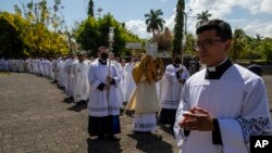Celebraciones del Jueves Santo, previo a una misa en la Catedral Metropolitana de Managua, Nicaragua, el jueves 6 de abril de 2023. (Foto AP/Inti Ocon)
