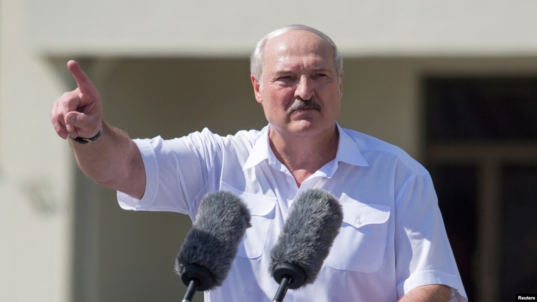 FILE - Belarusian President Alexander Lukashenko gestures as he delivers a speech during a rally of his supporters in Independence Square in Minsk, Belarus, Aug. 16, 2020. 