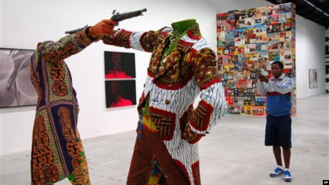 FILE - Installation by Nigerian artist Yinka Shonibare at the 52nd Biennale in Venice, Italy, June 2007.