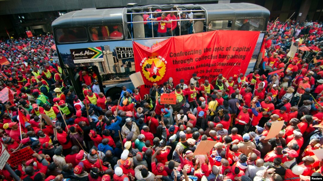 Members of the National Union of Metalworkers (NUMSA) march on the first day of a nationwide strike in Johannesburg, July 1, 2014.