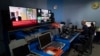 FILE - Al Jazeera broadcast engineer Mohammad Salameh works at the Master Control Room unit inside the network's office in the West Bank city of Ramallah, May 5, 2024. 