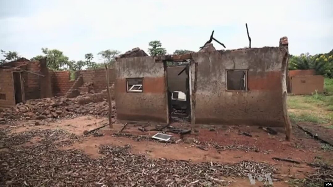FILE - Deserted, razed villages line more than 100 kilometers of road south of Bossangoa.
