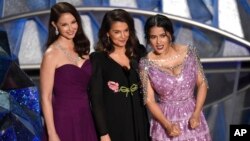 Ashley Judd, from left, Annabella Sciorra and Salma Hayek speak at the Oscars on Sunday, March 4, 2018, at the Dolby Theatre in Los Angeles. (Photo by Chris Pizzello/Invision/AP)