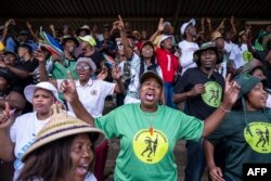 FILE - Supporters sing at the Mehlareng stadium in Tembisa at a recruitment drive for the Umkhonto We Sizwe political party of former South African President, Jacob Zuma on January 21, 2024.