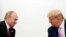 ARCHIVO - El presidente de Estados Unidos, Donald Trump, y el presidente ruso, Vladimir Putin, sostienen una reunión bilateral en la cumbre de líderes del G20 en Osaka, Japón, el 28 de junio de 2019. 