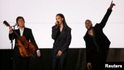 Paul McCartney, Rihanna and Kanye West (R) perform "FourFiveSeconds" at the 57th annual Grammy Awards in Los Angeles, California, Feb. 8, 2015. 