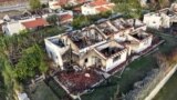 FILE - Damaged houses are seen, following the deadly October 7 attack by gunmen from Palestinian militant group Hamas from the Gaza Strip, in Kibbutz Beeri in southern Israel, November 28, 2023.