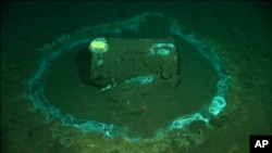 In this 2011 image provided by the University of California Santa Barbara, a barrel sits on the seafloor near the coast of Catalina Island, California. (David Valentine/UC Santa Barbara / RV Jason, via AP)