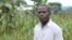 Edie Mukiibi, the new vice president of Slow Food International, at a school garden he helped create in Mukono, Uganda, July 22, 2014. (Hilary Heuler/VOA)