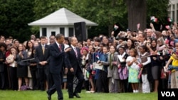 Los presidentes Obama y Calderón en los jardines de la Casa Blanca durante la visita del mandatario mexicano en 2010.