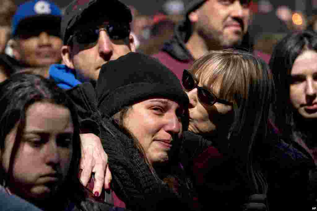 Members of the audience become emotional as Edna Chavez, of Manual Arts High, south of downtown Los Angeles, speaks during the &quot;March for Our Lives&quot; rally in support of gun control in Washington, Saturday, March 24, 2018. (AP Photo/Andrew Harnik)