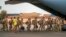 FILE: FILE - French Barkhane force soldiers who wrapped up a four-month tour of duty in the Sahel leave their base in Gao, Mali, June 9, 2021. French officials announced Monday Aug. 15, 2022 that the last soldier from the operation has now left Mali, 