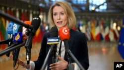 European Union foreign policy chief Kaja Kallas speaks with the media as she arrives for a meeting of EU foreign ministers at the European Council building in Brussels, Jan. 27, 2025.