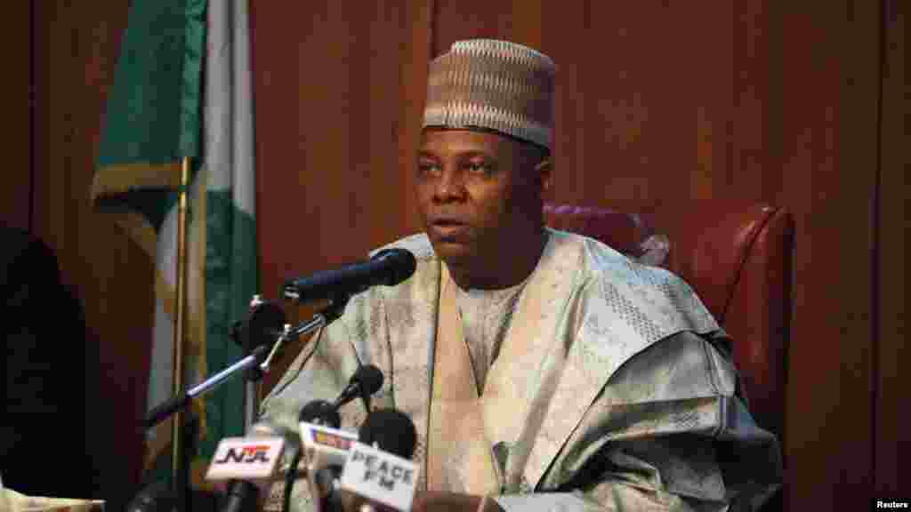 Borno state Governor Kashim Shettima speaks to a team of military investigators from the Defence Ministry during a meeting in Maiduguri, in the aftermath of fighting between security forces and Islamist militants in Baga