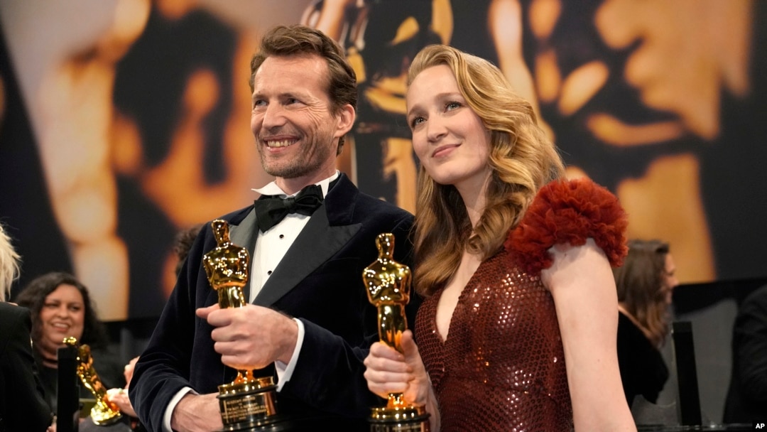Trent, left, and Victoria Warmerdam, winners of the award for best live action short film for "I'm Not a Robot," attend the Governors Ball after the Oscars on March 2, 2025, in Los Angeles.