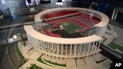 Miniature model of the National Stadium on display during preparations to host 2014 soccer World Cup, Brasilia, Brazil, April 1, 2013.