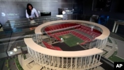 Miniature model of the National Stadium on display during preparations to host 2014 soccer World Cup, Brasilia, Brazil, April 1, 2013.