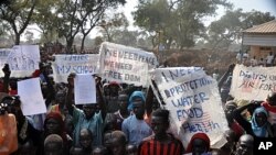 Refugees protest at Yida camp in South Sudan at the lack of UN military intervention and humanitarian assistance to provide food, water, schooling and health services, November 17, 2011.