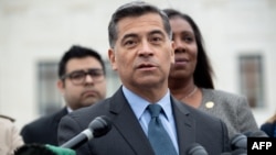 (FILES) In this file photo taken on November 12, 2019 California Attorney General Xavier Becerra speaks following arguments about ending DACA (Deferred Action for Childhood Arrivals) outside the US Supreme Court in Washington, DC. - Joe Biden plans…