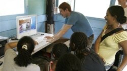 An instructor shows a slide show during a class at the Homeward Bound Camp in Bear Mountain, New York. The Coalition for the Homeless operates the camp.