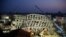 In the early morning, emergency rescuers continue to search for the missing in a collapsed building from an earthquake in Tainan, Taiwan, Feb. 7, 2016. 