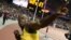 Jamaica's Usain Bolt reacts after winning the men's 100 meters race, August 5, 2012.