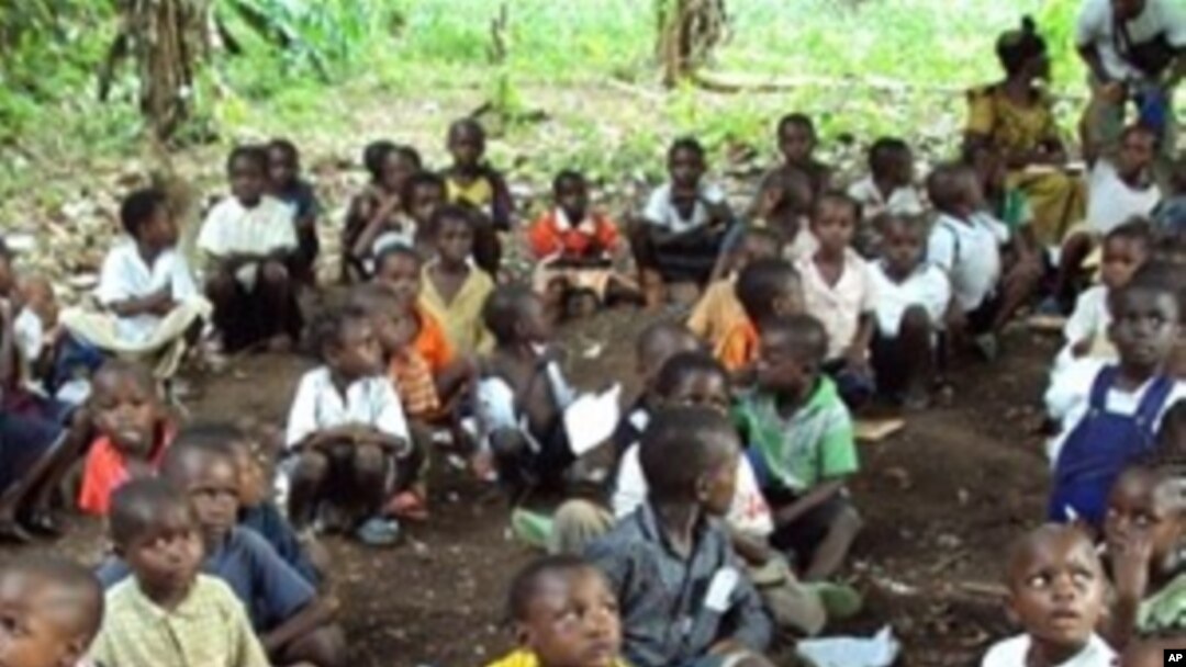 Refugee children from the Democratic Republic of Congo attend class in a forest near Gangania, more than 850 km north of Brazzaville, the capital of neighboring Congo. Most of the teachers are also refugees who fled inter-ethnic violence in the northweste