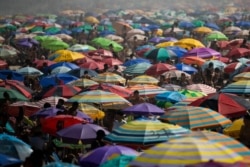 People pack the Ipanema beach amid the new coronavirus pandemic in Rio de Janeiro, Brazil, Sept.6, 2020.