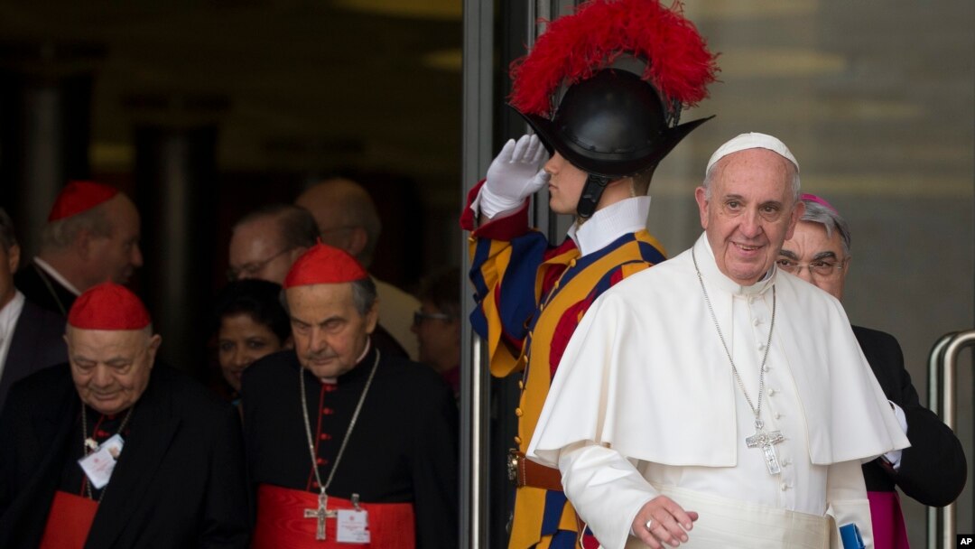 Pope Francis leaves a morning session of the Synod of bishops, at the Vatican, Oct. 5, 2015. He urged the contentious gathering of the world's bishops on family issues to put aside personal prejudices and have the courage and humility to be guided by God.